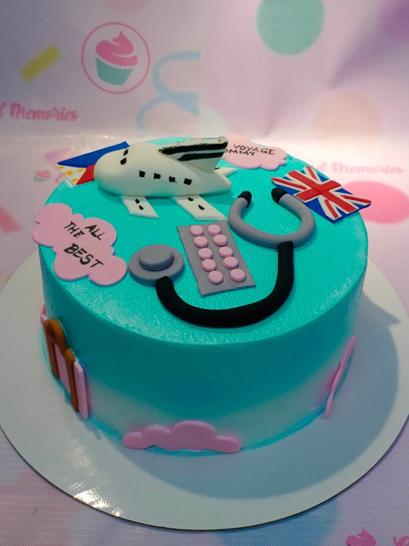 This delightful custom decorated cake is perfect for a traveler's special birthday. It features a colorful design of airplanes, passports, and countries, with shades of blue, green and teal. Perfectly topped with a "Bon Voyage" or "Au Revoir" message, this cake is guaranteed to bring an adventurous spirit to any celebration.
