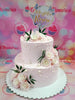 This beautiful, custom-decorated wedding cake is perfect for any special occasion. It features delicate pink roses, pearl dragees, and a butterfly topper, making it ideal for 20th, 30th, 40th, 50th, and 60th wedding anniversaries, birthdays, and weddings. Show your loved one your special feelings and make a wonderful celebration with this cake.