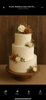 Three-tier ivory buttercream wedding cake with textured frosting, white and burnt orange roses, and eucalyptus foliage
