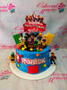 Blue round Roblox birthday cake with toy figures, fondant logo and brick accents, single tier