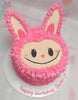 This Labubu Cake features a charming pink design adorned with cute bunny ears and expressive eyes, perfect for Sachi's birthday celebration. The single-tier cake is a trending choice, showcasing fun and vibrant elements.