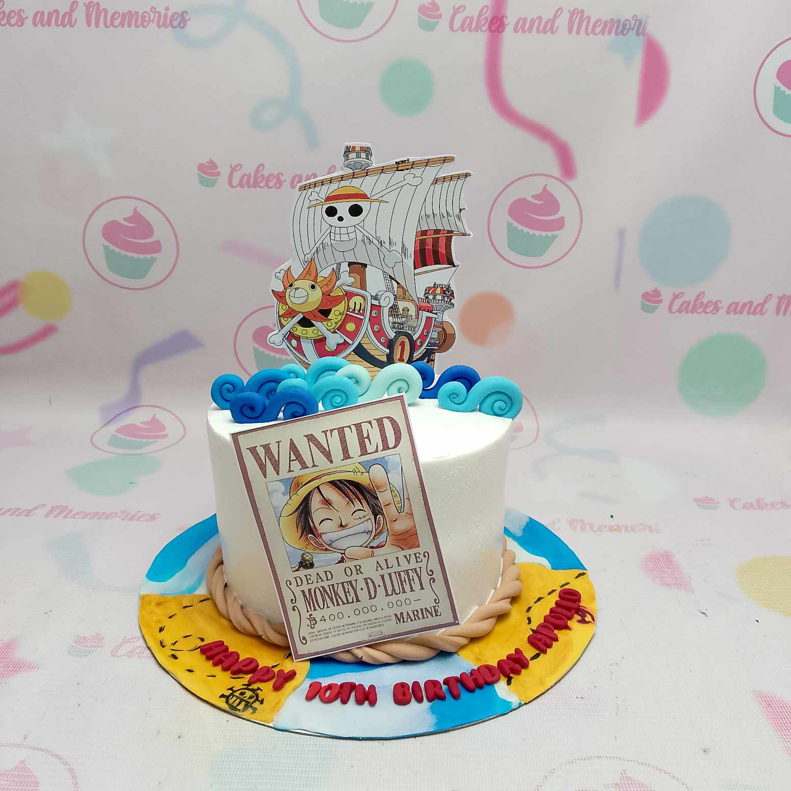 Celebrate your child's birthday with our captivating One Piece Cake, featuring a stunning design that showcases a blue ocean adventure with pirates and Luffy. This custom 1-tier cake is perfect for any young anime fan's special day!