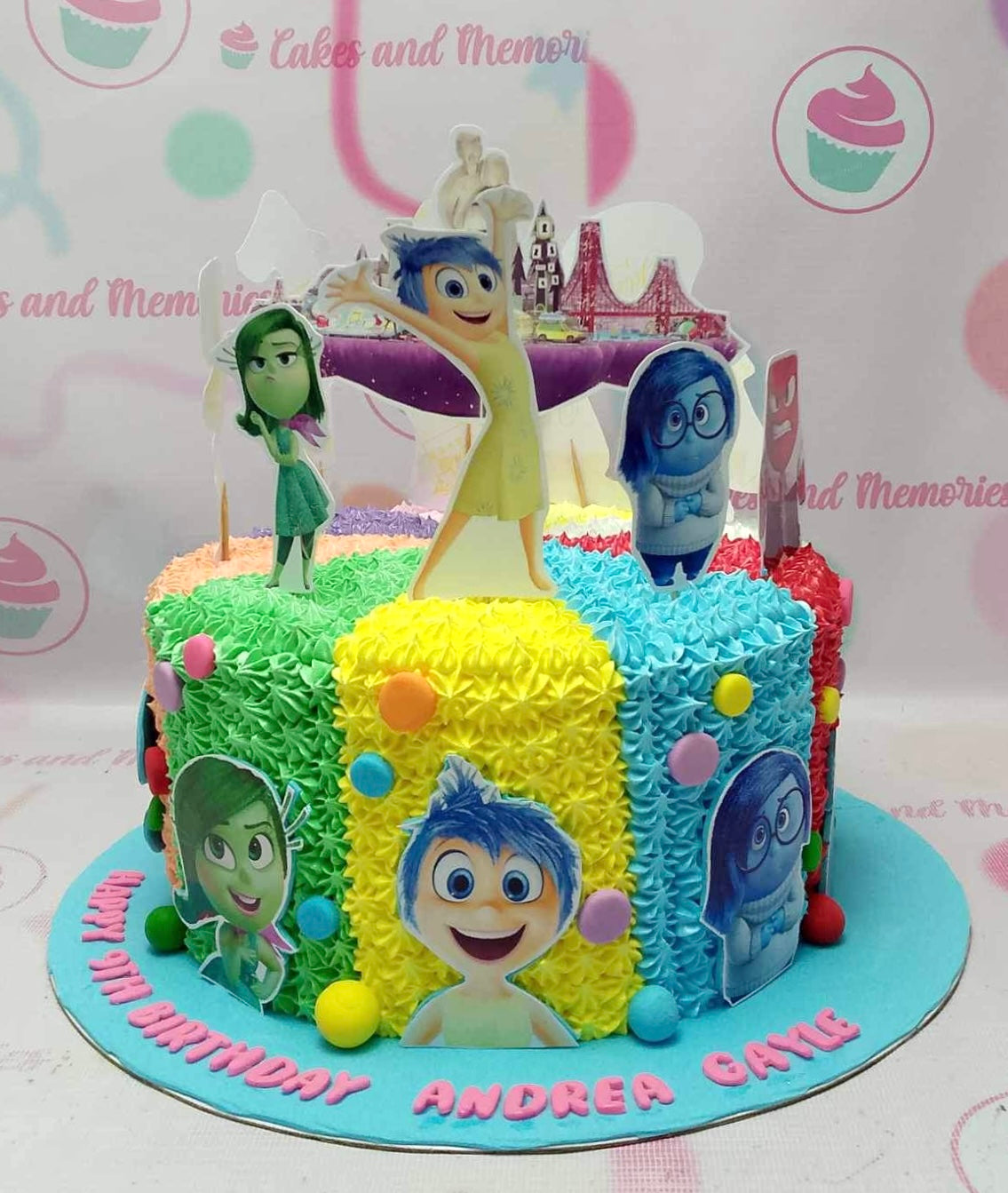 Be captivated by this colorful Inside Out Cake featuring vibrant blue, yellow, green, and red hues that represent the emotions of joy, sadness, anger, disgust, and fear from the beloved Pixar animated movie. Topped with playful printout toppers, this 1-tier, 1-layer cake brings a playful touch of nostalgia to any celebration.