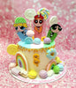 This enchanting cake features the Power Puff Girls surrounded by pastel colors and playful elements like lollipops, rainbows, macarons, and marshmallows, celebrating an 8th birthday with a striking number 8. The 1-tier design is adorned with printed toppers and colorful candies, creating a delightful centerpiece for any celebration.