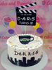 This 1-tier Friends Cake features a stunning cityscape design with a Central Perk mug and a clapperboard, adorned with colorful sprinkles. Perfect for a 30th birthday celebration, it showcases themed printout toppers inspired by the iconic TV show.