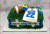 This custom designed sports cake features a vibrant green color scheme with an American football theme, perfect for fans of the NFL and the Dallas Cowboys. The rectangular cake showcases a touchdown scene with a football jersey design, making it an ideal celebration piece for kids and gentlemen alike.