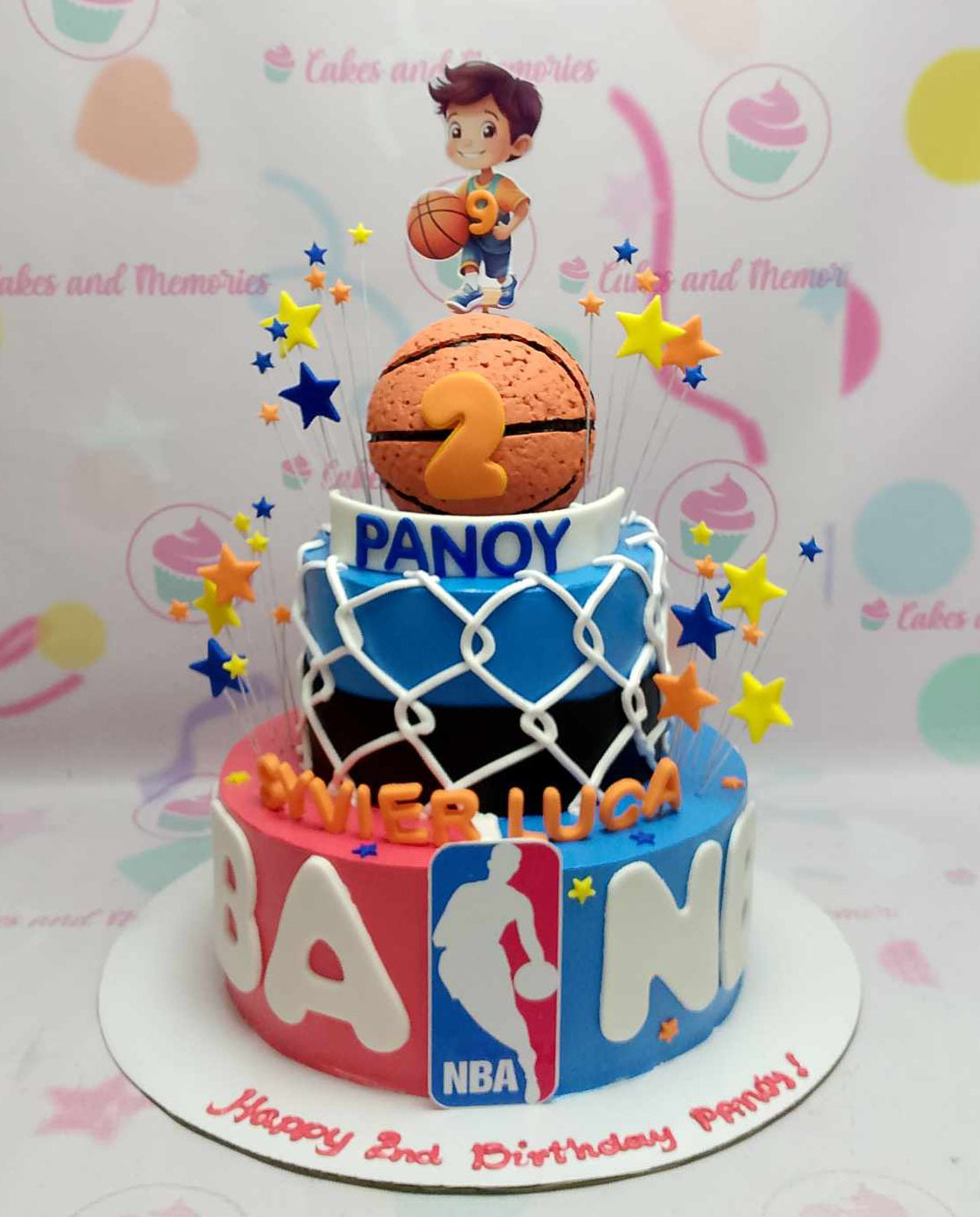 Celebrate your little sports fan's special day with our vibrant 2-tier Basketball Cake, featuring dynamic blue and red colors perfect for NBA enthusiasts. Customized for your young star, this cake symbolizes fun and joy, making it an ideal choice for kids’ birthdays and family gatherings.