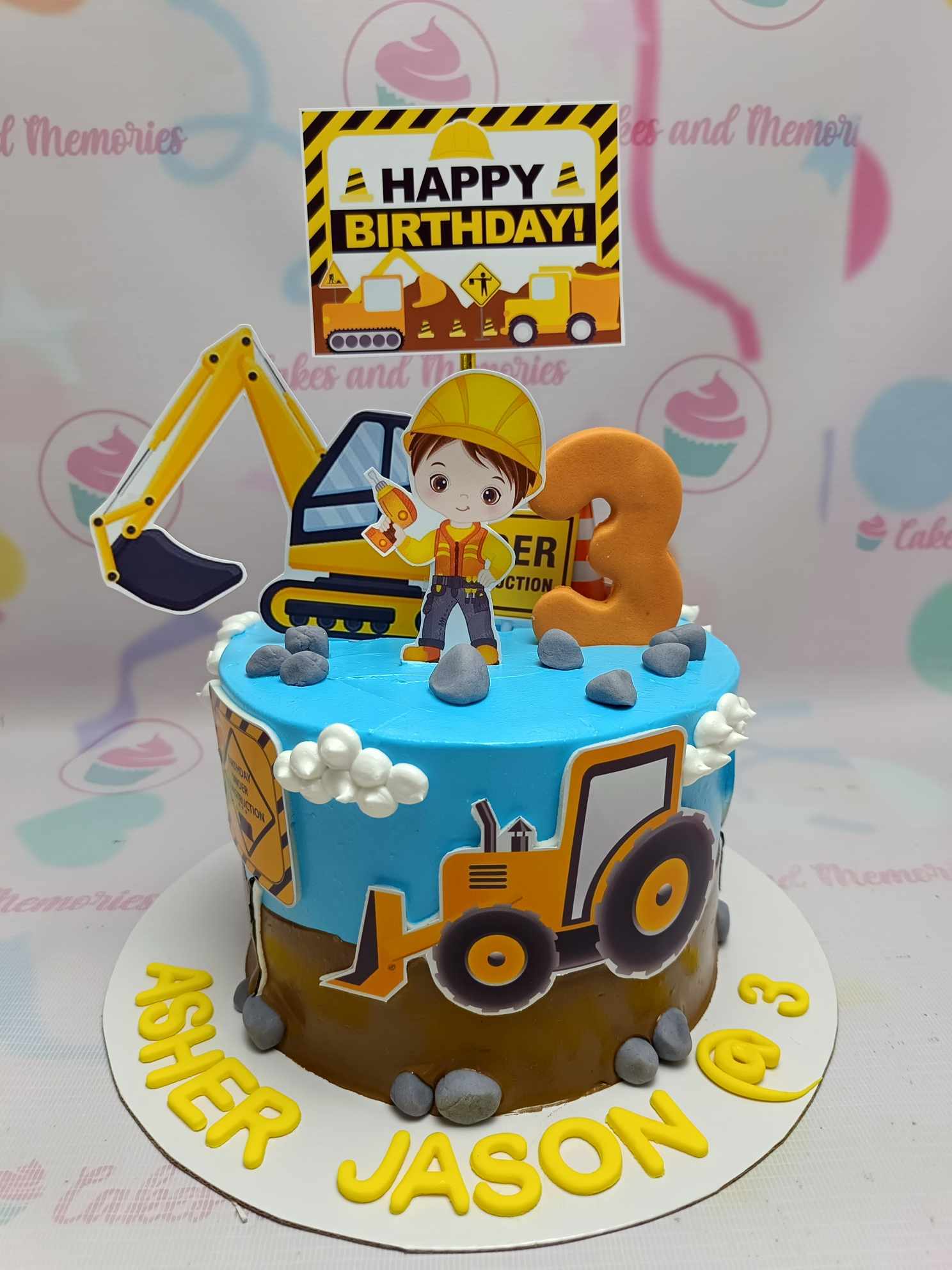 This vibrant construction cake features a striking blue and yellow design, adorned with playful toys like an excavator and bulldozer, perfect for any kid's birthday celebration. Customize your 1-tier cake to build a fun and memorable experience for your little construction enthusiast!