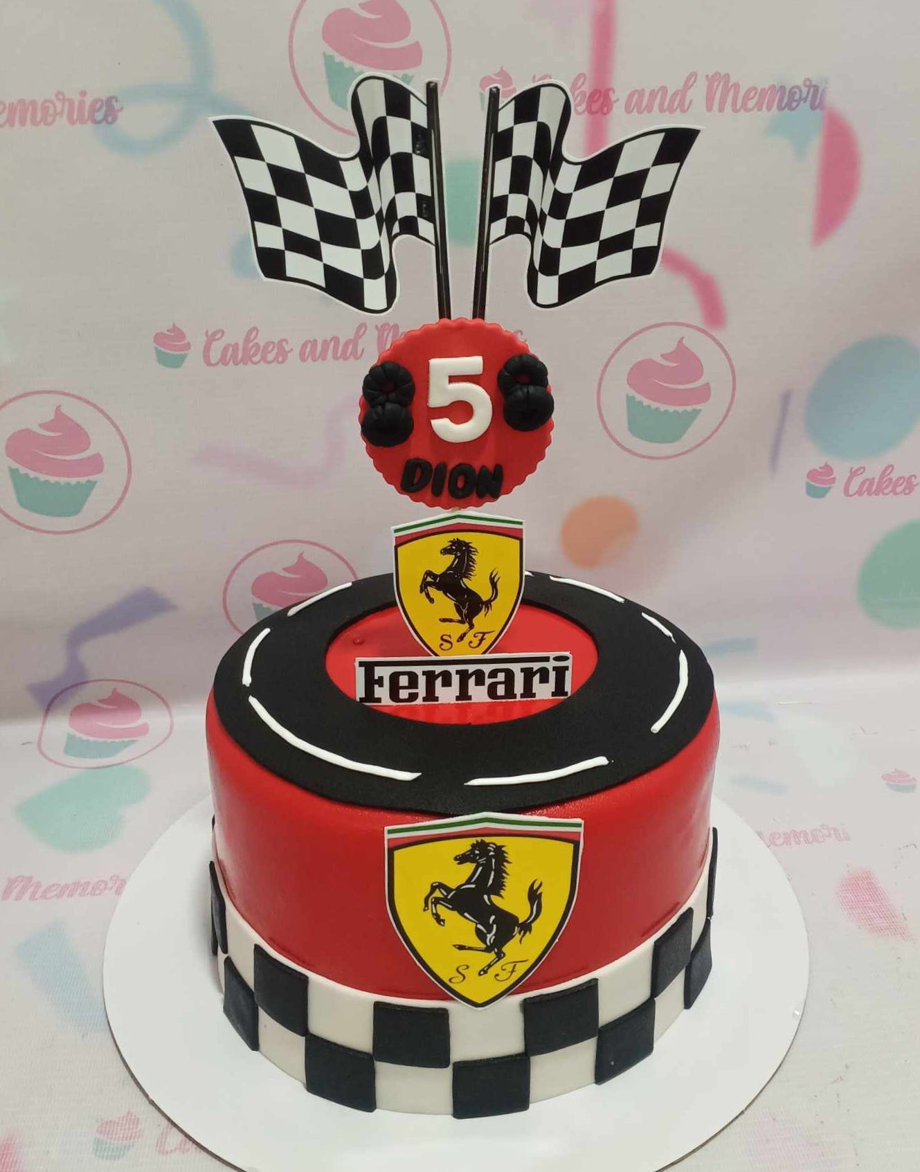 Celebrate in style with our stunning Ferrari Cake, featuring a vibrant red and black design adorned with a racing flag and the iconic yellow horse logo. This customized one-tier masterpiece is perfect for any sports car enthusiast's birthday celebration, showcasing intricate fondant details and printed toppers inspired by luxury vehicles.