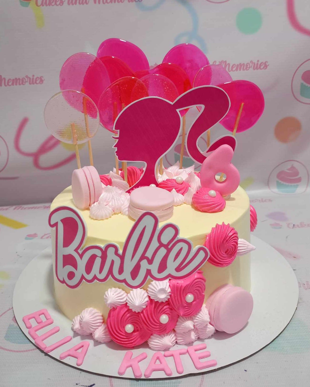 Delight your little ones with this stunning Barbie Cake, featuring a vibrant pink design adorned with creamy frosting, colorful candies, and whimsical lollipop accents. Perfect for birthdays, this one-tier cake is sure to bring joy to any celebration for girls and kids alike!