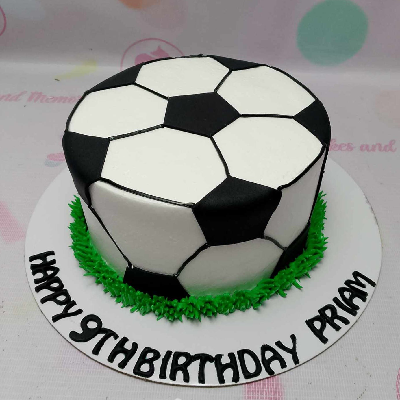 Celebrate your child's birthday with a stylish soccer cake showcasing a classic black and white design, featuring a detailed soccer ball on top. Perfect for sports enthusiasts, this 1-tier creation is a customized treat for fathers, brothers, and kids alike.