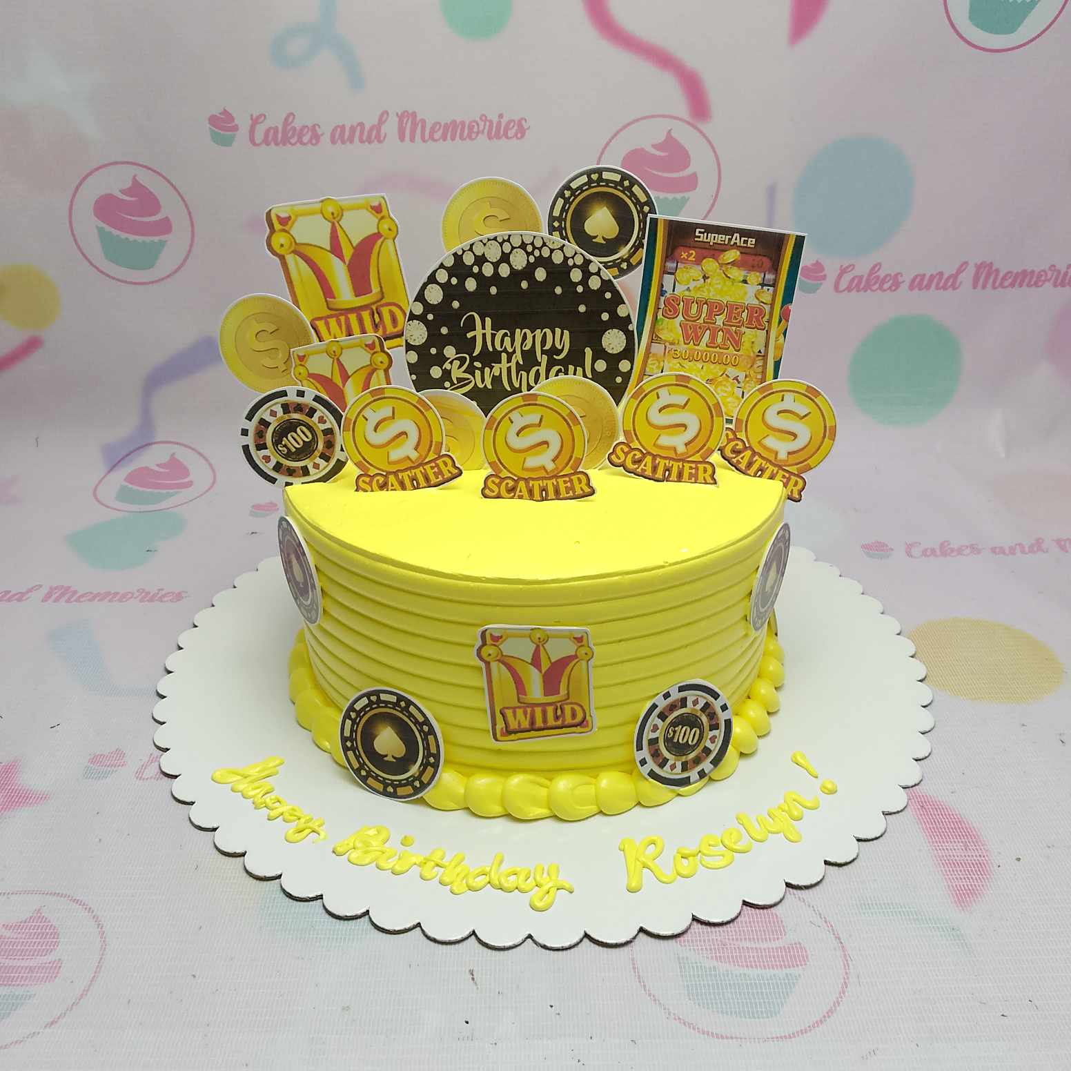 Celebrate your lucky day with our stunning Casino Cake, featuring a vibrant yellow and gold design inspired by online gambling excitement. This charming 1-tier cake showcases scattered symbols of fortune and super wins, perfect for any casino-themed event!