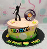 This vibrant Disco Cake features a peach and green color scheme adorned with a vinyl record design, perfect for celebrating a groovy 60th, 70th, or 80th birthday. Ideal for dance enthusiasts and fans of ABBA, this one-tier cake captures the spirit of the dancing queen era.