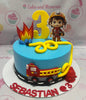 This vibrant blue Fire Fighter Cake features a charming fire truck on top, complete with a detailed water hose, perfect for any young fire fighter's birthday celebration. Customized with fiery accents, this 1-tier cake is an eye-catching centerpiece for memorable milestones.