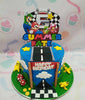 Celebrate your special day with a vibrant Super Mario Cake featuring blue and green colors, perfect for any video game enthusiast! This one-tier masterpiece showcases Mario and his friends in a thrilling Mario Kart racing scene, making it an ideal choice for birthday celebrations.