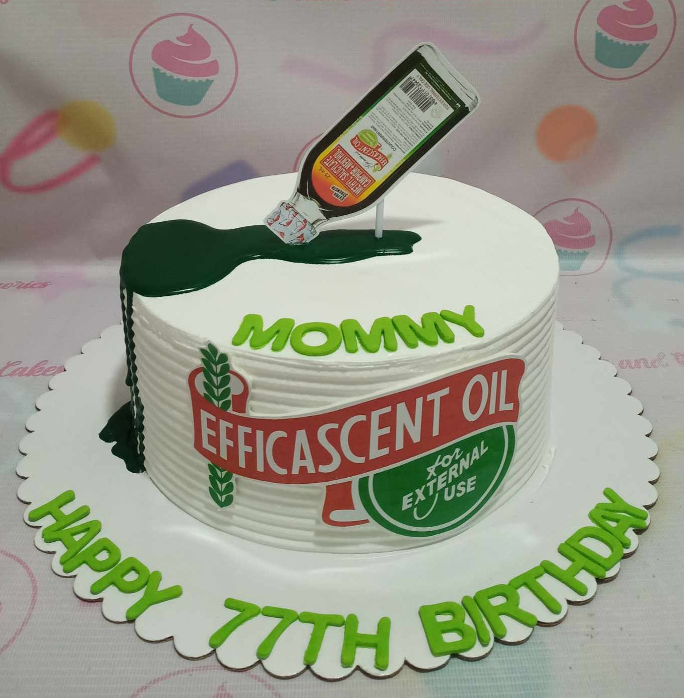 This unique Efficascent Oil Cake features a stunning white and green color scheme, adorned with elegant white flowers and playful printout toppers inspired by salonpas and katinko. Perfect for novelty celebrations, this one-tier cake is sure to be a conversation starter at any event.