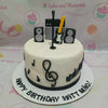 This stunning 1-tier Music Cake features a sleek white fondant finish adorned with intricate music notes and a vibrant electric guitar, perfect for rock and roll enthusiasts. Ideal for birthdays and celebrations, it's a customized masterpiece that captures the essence of concert vibes and soulful melodies.