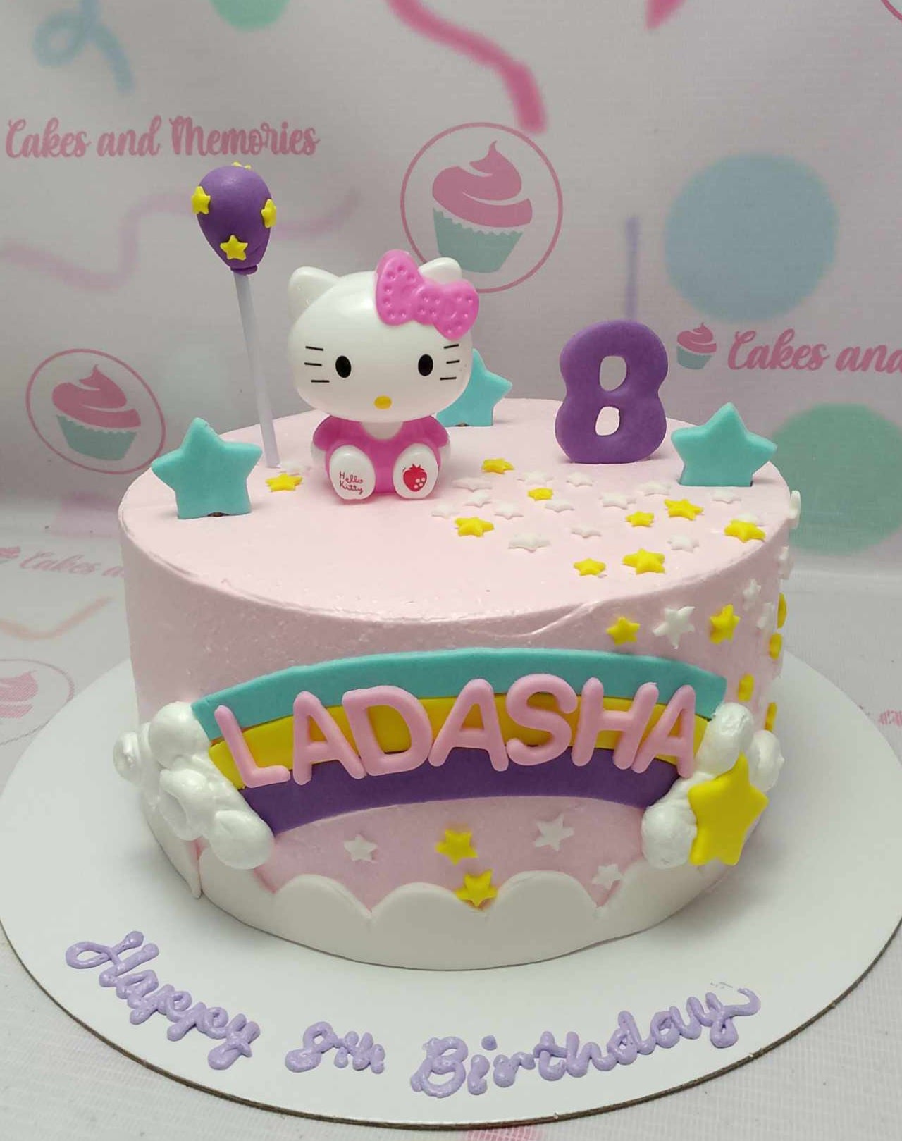 This adorable Hello Kitty cake features a pink design with a rainbow backdrop and teal stars, perfect for any baby birthday celebration. A single-tier masterpiece, it embodies the cuteness of Sanrio's beloved character, Hello Kitty.