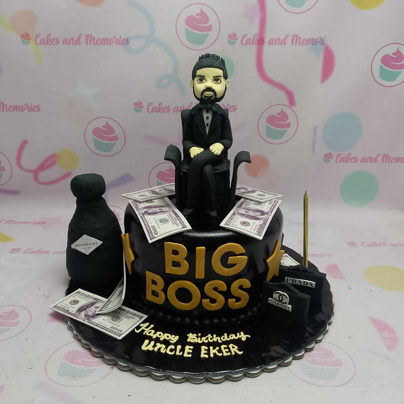 Presenting our exquisite Boss Cake, a luxurious one-tier masterpiece adorned in sleek black fondant with stunning gold accents. Perfect for celebrating leaders, CEOs, and those with a flair for success, this cake embodies wealth and sophistication with its clever cash and dollar design.