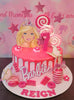 This stunning Barbie Cake features pink dripping, delightful lollipops, and playful stars alongside charming butterflies and flowers, perfect for a 7th birthday celebration. Adorned with printout toppers and popsicles, it captures the imagination of every girl who loves dolls.