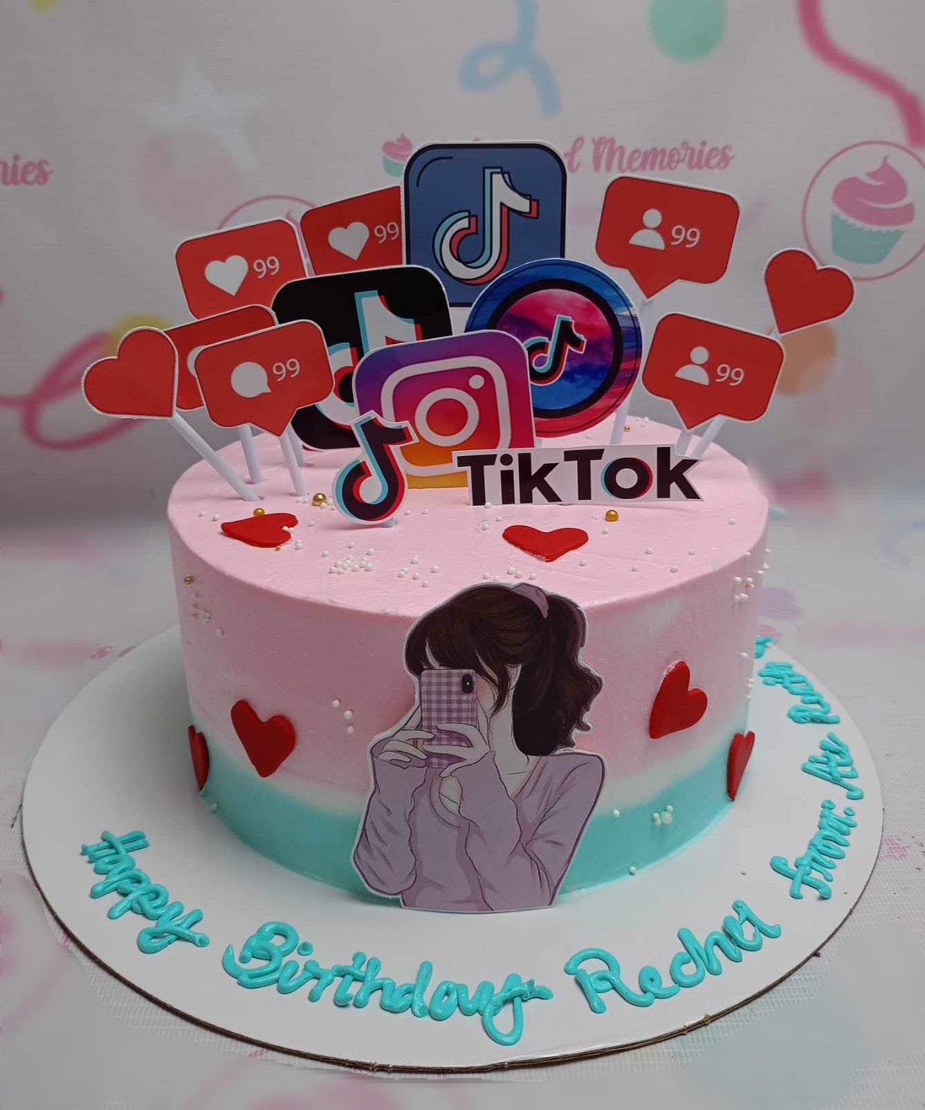 A delightful TikTok-themed cake featuring a stunning pink and teal design with playful printout toppers, perfect for celebrating birthdays in style. This one-tier creation is adorned with a charming drip effect and is sure to be a hit on social media platforms like Instagram.