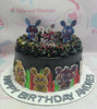 This vibrant Video Games Cake features a striking black design inspired by Five Nights at Freddy's, complete with playful printout toppers of Freddy Fazbear, Chica, Mangle, and Spring Bonnie, all adorned with colorful candy sprinkles. Perfect for birthday celebrations, this whimsical, customized cake is ideal for kids who love gaming!