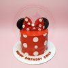 Minnie Mouse birthday cake, red with white polka dots, black ears, red bow, and 'Happy Birthday Chick' text.