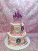 Two-tier Disney Princess 7th birthday cake for Margaux, with Aurora, Ariel, Jasmine edible prints, pink buttercream, ribbons, and butterflies.