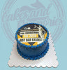 One-tier congratulations cake with Lady Justice edible print for passing bar exams, dark blue buttercream, gold sprinkles.