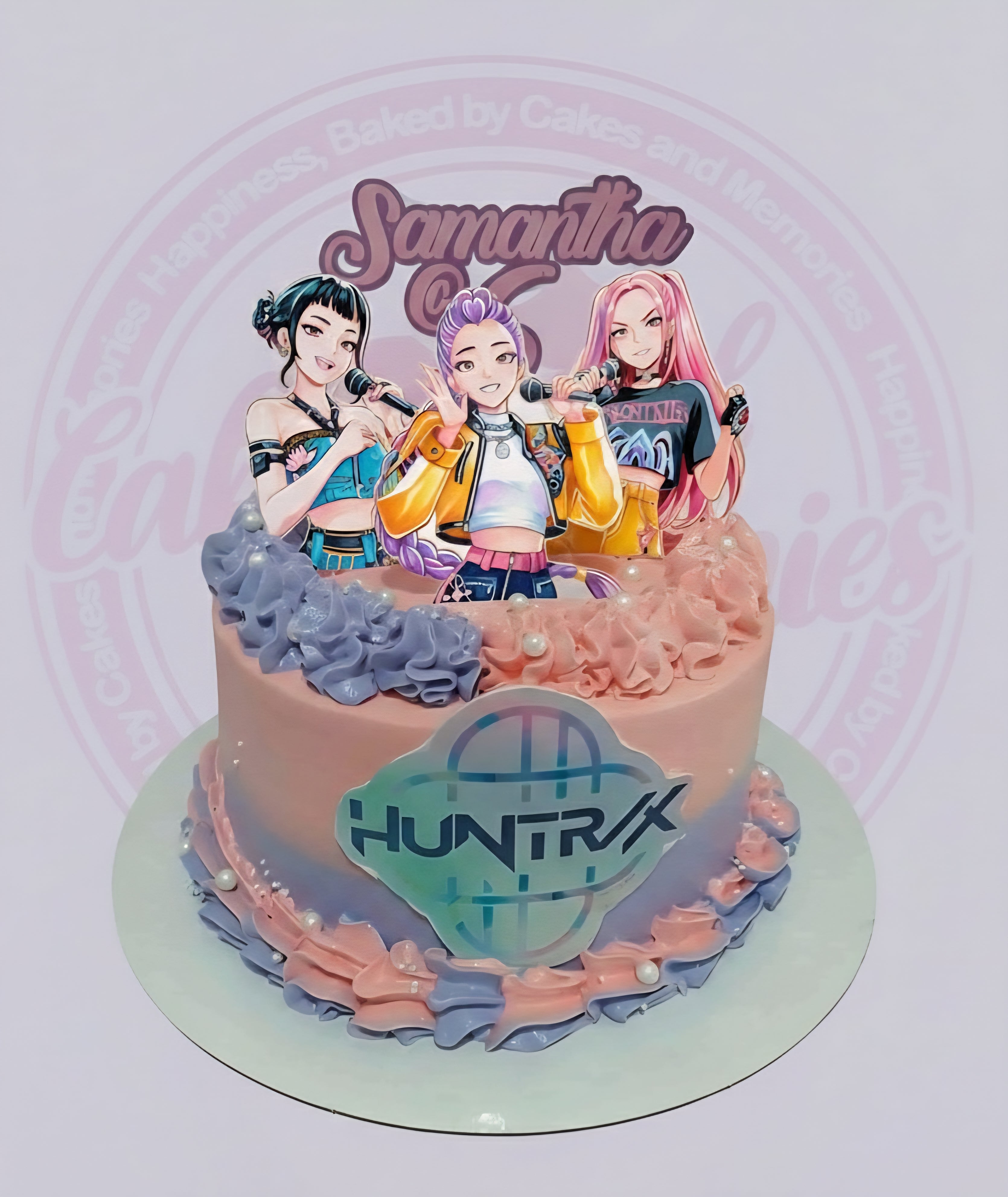 One-tier custom K-pop birthday cake with three anime girls singing, "Samantha" topper, and "HUNTRAX" logo, in pink, purple, and blue.