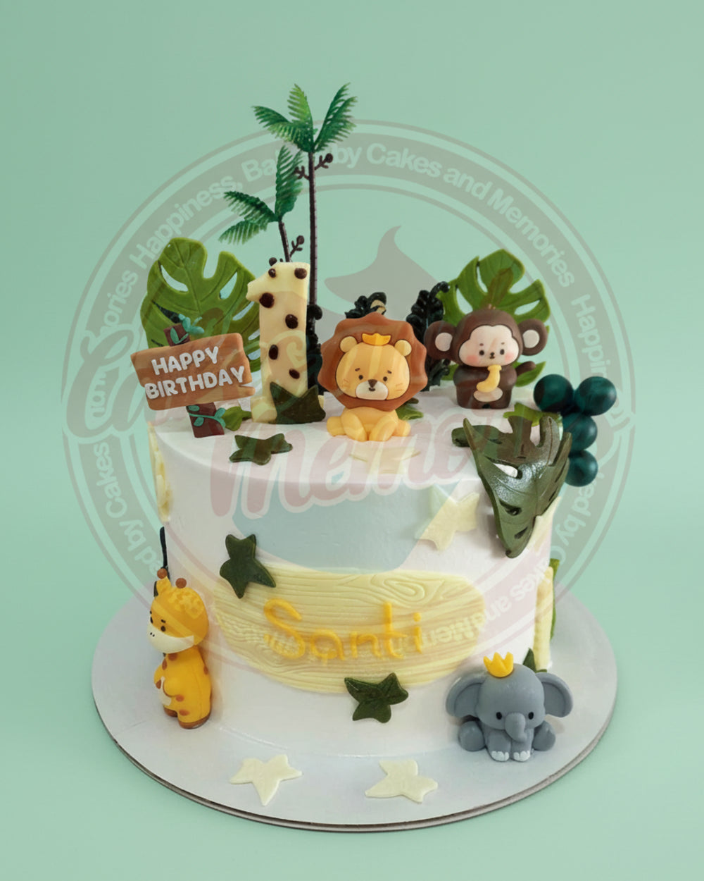 One-tier safari birthday cake with fondant jungle animals, palm trees, "Happy Birthday" sign, "1" topper, and "Santi" name in white and cream.