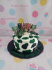 One-tier military-themed birthday cake with green and black camouflage, army figurines, and 'Fiorell Drae @ 5' text.