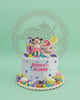 1-tier candyland birthday cake for Quinn Elisse's 4th birthday, featuring a girl topper, colorful lollipops, candies, and gift boxes.