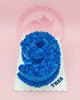 Number 9 birthday cake with vibrant blue buttercream rosettes and white sprinkles, personalized with 'TRES' on the board.