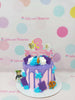 One-tier Roblox birthday cake with pink base, purple drip, 
