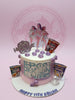K-pop Demon Hunters birthday cake for Keilah, 11th, with girl toppers, custom text, and character noodle prints in white, purple, pink.