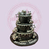 Three-tier black and silver disco birthday cake with disco balls, stars, drip icing, and 'Happy 60th Birthday Sandra'.