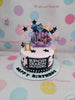K-Pop Demon Hunters birthday cake for Azumi's 11th, pink & black buttercream, edible print, star toppers.