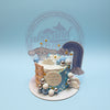 One-tier Cinnamoroll birthday cake with sky theme, blue/white icing, rainbow, clouds, stars, and 'Happy 7th Birthday Amhira Zhavia' plaque.