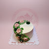 One-tier round buttercream birthday cake with pink roses and green succulents, 'Happy Birthday Cherry!' on board.