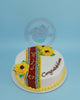 One-tier congratulations cake with Baybayin script, vibrant sunflowers, and 'Congratulations' text in white, maroon, yellow, and blue.