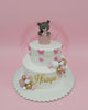 Two-tier teddy bear fondant cake with pink bows, hearts, gold 