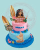 Two-tier Moana theme birthday cake with Moana, Maui, Pua, surfboards, boat, and name SHEENA LEOU in pink and blue.