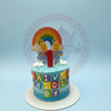 One-tier Bananas in Pyjamas birthday cake for twins Raiven and Raiden, with rainbow, '1' topper, and name blocks on blue icing.