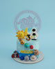 One-tier space-themed birthday cake for a 3-year-old named Miggo, with fondant sun, moon, astronaut, rocket, and smiling planets on blue icing.