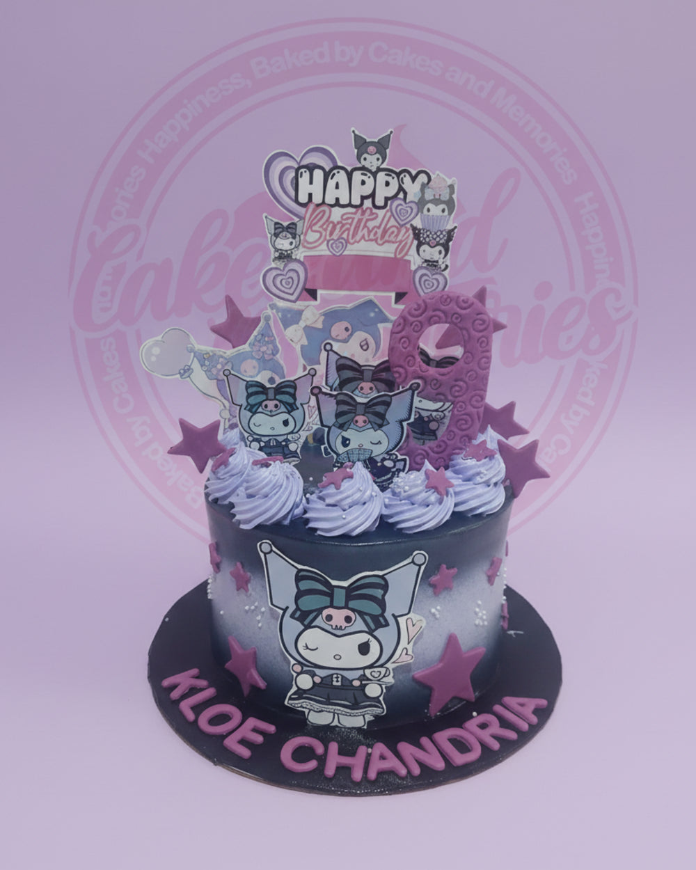 Custom birthday cake featuring Kuromi characters, a dark purple to white gradient, piped swirls, stars, and the name KLOE CHANDRIA.