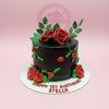 Custom 1st birthday cake with dark brown icing, vibrant red roses, and green leaves, celebrating 