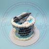 One-tier custom airplane birthday cake with a grey fighter jet topper, white clouds, and 'Happy Birthday Raymund Finley' text.