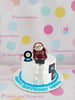 One-tier fondant birthday cake for Mom, featuring a woman with laptop, record player, and app icons in white, blue, and black.