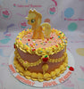 Celebrate your child's special day with our vibrant My Little Pony Cake, featuring a charming vintage look in orange, peach, and brown hues. Adorned with colorful sprinkles and a delightful printout topper of Applejack, this customized one-tier birthday cake is perfect for little pony fans!